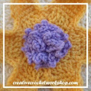 The Rapunzel Flower | Free Crochet Pattern | American Crochet @americancrochet.com @creativecrochetworkshop.com #freecrochetpattern