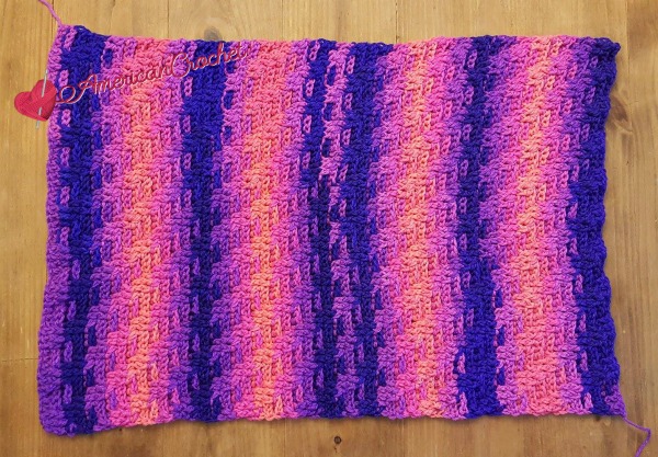Rainbow Twist Pillow Cover | Crochet Pattern | American Crochet @americancrochet.com