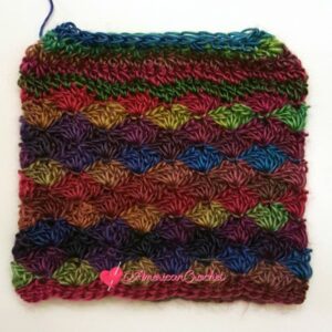 Carousel Dream Messy Bun Hat | Free Crochet Pattern | American Crochet @americancrochet.com #freecrochetpattern