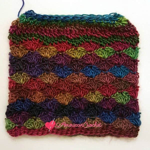 Carousel Dream Messy Bun Hat | Free Crochet Pattern | American Crochet @americancrochet.com #freecrochetpattern